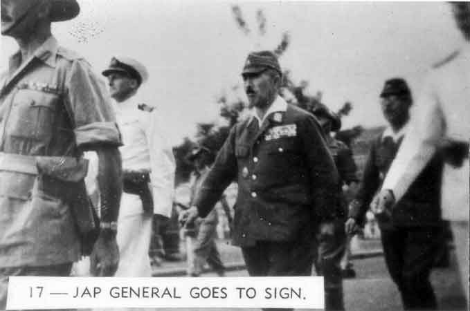 017 - Jap General goes to sign
Senior Japanese officers being escorted to the Singapore Municipal Buildings for the signing of the surrender terms. 
