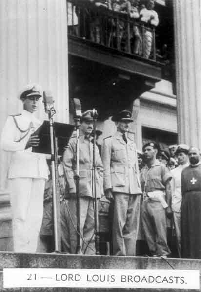 021 - Lord Louis broadcasts
Admiral Mountbatten gives a public address on the steps of the Singapore Municipal Buildings during the Japanese surrender ceremony. To the right of Mountbatten are Lieut. General Wheeler and Air Chief Marshal Sir Keith Park.
Keywords: Surrender