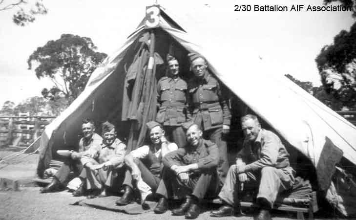 Training in Goulburn
At Goulburn Showground about August, 1940.

Left to right:

Back row (standing):
1)
2)

Front row (seated):
1)
2)
3)
4) NX27550 - WILSON, David Royce (Doc), A/Cpl. - A Company, 9 Platoon
5)
