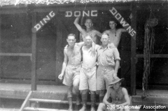 Ding Dong Downs, Batu Pahat
"D" Company Orderly Room, Batu Pahat. Known as "Ding Dong Downs".

Left to right:

Back row:
1) NX41262 - HICKSON, Brian Murray Prior, Cpl. - D Company, 18 Platoon
2) NX37529 - CURRAN, Maxwell William (Snake), Pte. - D Company, 16 Platoon

Middle row:
1) NX54877 - WEBSTER, Leslie, Pte. - D Company or NX36533 - WEBSTER, Sidney Linden, Pte. - D Company
2) NX41230 - GOLLEDGE, Robert Charles (Red or Charlie), Cpl. - D Company, 18 Platoon
3) NX47890 - CAMPBELL, Alexander, Pte. - D Company

Front row (seated):
1) NX41360 - WHITE (Rhodes-White), Robert Rhodes (Robert), Cpl. - D Company, 18 Platoon
