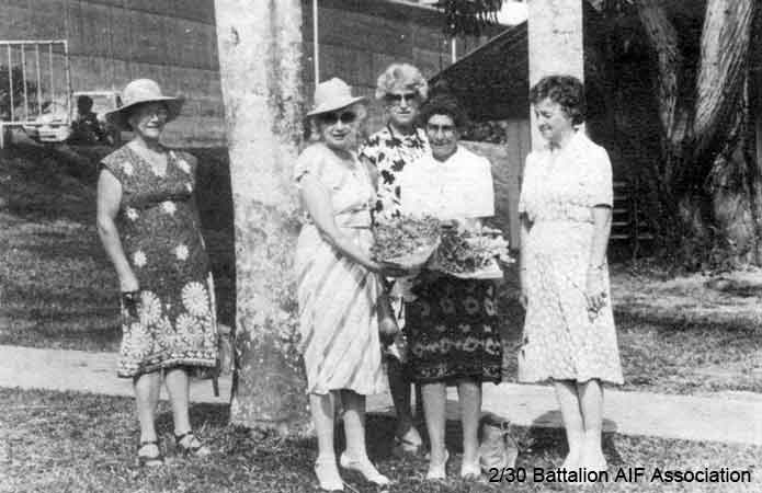 Makan 269
"Outside Changi Gaol, ladies of the 2/30 Bn. AIF Association Auxilliary, with the flowers to be placed on the Chapel Altar. Jean Hohnston, Norma Christensen, Molly Forward, Cora Newman and Marion Brown."
Keywords: 061222 Makan269