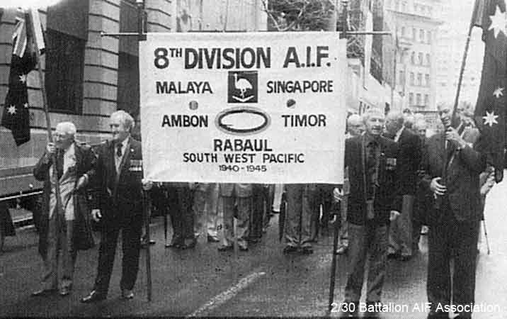Anzac Day, Sydney, 1990?
Leading the 8th Division.

Left to right (holding banner):

1) NX59138 - SULLIVAN, Francis Michael (Sully or Frank), A/Cpl. - B Company, 10 Platoon 
2) NX29116 - BROWN, Raymond John Tresillian (Ray), Pte. - B Company, 12 Platoon
Keywords: 061230 AnzacDay1990
