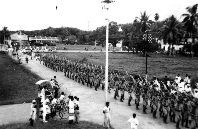 On Parade, Batu Pahat
Bill Moynihan wrote:

"Our Company bringing up the rear of the Bn. in the march past at B.P." 

This photo was taken at Batu Pahat and shows D Company, 17 Platoon. A date stamp on the back of the photo is 22/11/1941.

NX32703 - MOYNIHAN, William James (Bill ), Sgt. - D Company, 17 Platoon 


Keywords: 090811a