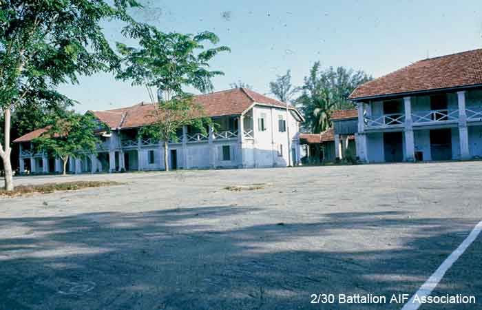 Parade Square, Blakang Mati
Disused buildings at Parade Square, Sentosa in 1975. During the war, these buildings were used by the Japanese guards as their main sleeping quarters.

The buildings were refurbished in 2004 and became the Sentosa Tourism Academy.
Keywords: 061226