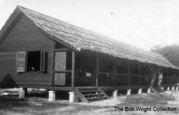 Signals hut, Batu Pahat
"This is our hut. Not bad, eh!! Oct. 1941"

1. The photographs are to be known as The Bob Wright Collection.
2. Reproduction of the Collection or any part of it is prohibited without written permission.
3. Permission is granted to the 2/30th Batallion Association to reproduce the Collection as it deems appropriate.
4. Permission is granted to the Australian War Memorial Museum to reproduce the Collection as it deems appropriate.
5. All other permission is specifically withheld.
6. Written application for permission to reproduce the Collection, or part of it, may be made to:
Mr I. Wright
95 Hewitt Avenue
Wahroonga 2076 New South Wales

