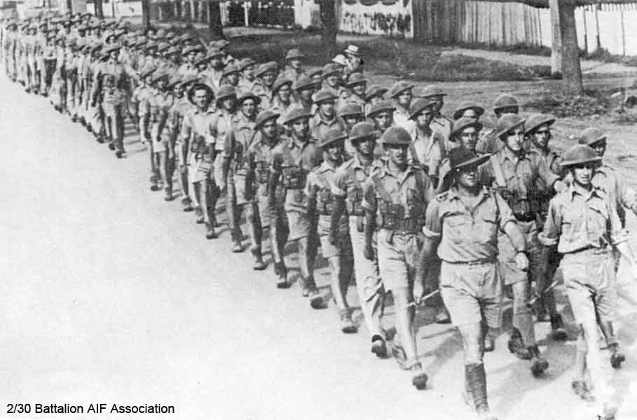 D Company, 17 Platoon
Marching in Tamworth.

Leading the march, left to right:

1) NX34711 - MELVILLE, William Sydney (Billy (The Pig)), Lt. Col. - D Company, O/C
2) NX70451 - DONOHOE, Kevin Gordon Cyril, Lt. - D Company, O/C 17 Platoon
3) NX51730 - ISAAC, Arthur William John (Ike), A/U/L/Sgt. - D Company, 17 Platoon

Also in this group:
No.7 right file: NX36660 - GRIST, Norman Sydney, Pte. - D Company, 17 Platoon
