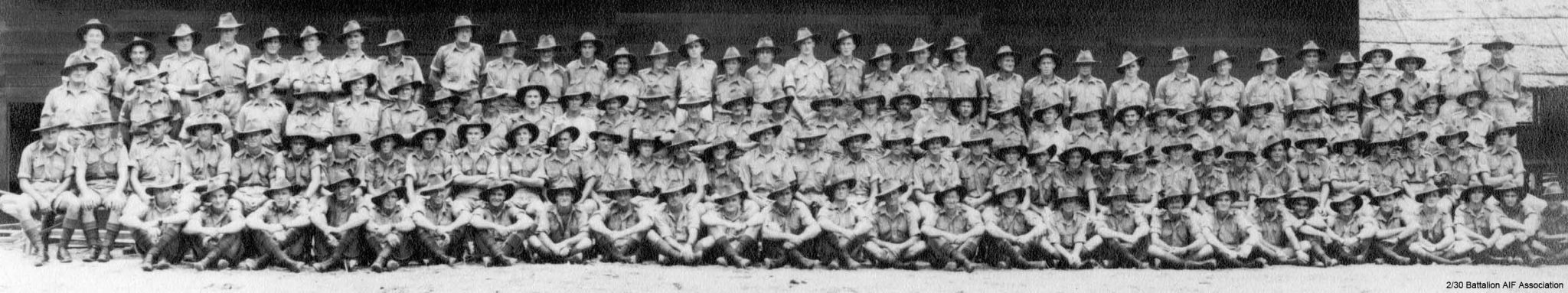 C Company
C Company at Batu Pahat, 1941.

Left to right:

Back row:
1) NX37615 - ANDERSON , Kelvin John Eric (Kel), Pte. - C Coy. 13 Pl. 
2) NX53042 - SIMPSON, John Thomas (Jack), Pte. - B Coy. 12 Pl. WiA Fort Rose, Doi Sonkurai 3 (Dysentery, Toxaemia following Amputation)
3) NX36545 - WILLIAMSON, Clarence, Pte. - C Coy. Doi Sonkurai 3 (Dysentery, Malaria)
4) NX37297 - DAVISON, William Arthur, Pte. - C Coy. to 2/20 Bn 18/10/1941 to join his brother
5) NX36528 - WOOD, Clarence William, Pte. - C Coy. 13 Pl. 
6) NX46619 - KORSCH, John Donald, Cpl. - C Coy. 14 Pl. 
7) NX26495 - McMAHON, Bernard Stanislaus (Stonja), Sgt. - C Coy. 14 Pl. 
8) NX41134 - EATHER, Walter Barnett, Sgt. - C Coy. 15 Pl. 13 Pl - A/A Pl
9) NX37593 - COMMANS, John Poole (Jack), Pte. - C Coy. 15 Pl. WiA Gemas
10) NX29461 - SPRING, Alan Thomas, Pte. - C Coy. KiA St. Andrew's Cathedral, Singapore
11) NX47456 - ROWE, Aubrey Nelson (Jack), A/Cpl. - C Coy. 15A Pl. WiA Fort Rose, Doi Sonkurai 1 (Dysentery, Pneumonia)
12) NX54449 - JONES, George Francis McKenzie (Frank), A/L/Cpl. - C Coy. 15 Pl. 
13) NX47466 - REILLY, Arthur William, Pte. - C Coy. 15 Pl. Doi Kanburi (Dysentery)
14) NX33725 - SANDS, Richard Arthur, Pte. - C Coy. 15 Pl. KiA Gemas
15) NX37680 - HOLMAN, Trevor Ian, Pte. - C Coy. 15 Pl. Doi Sonkurai 3 (Dysentery)
16) NX36483 - WEISS, Harry Blanch, Pte. - C Coy. 13 Pl. WiA Gemas, Doi Sonkurai 3 (Beri Beri)
17) NX36501 - PRATT, James, Pte. - C Coy. Coy. HQ Pl. WiA Gemas, Doi Sonkurai 3 (Dysentery) 
18) NX66981 - DENGATE, Edgar Norman, Lt. - B Coy. O/C 12 Pl. Lt. from 10/11/1941
19) NX37632 - SMEDLEY, Walter Rex, Pte. - C; HQ Coy. 15; Carrier Pl. Driver/Mechanic, Carrier 13; Doi Khorkan
20) NX37476 - GANTLEY, Alfred James, Pte. - BHQ Coy.
21) NX47218 - GRAINGER, Stanley Harold, Pte. - C Coy. 15A Pl. 
22) NX37366 - TOWERS, Keith Lloyd, L/Cpl. - C Coy. 14 Pl. 
23) NX47760 - MARSH, Stanley Frederick, Pte. - C Coy. 14 Pl. Doi Sonkurai 1 (Cholera)
24) NX36535 - RANDLE, Edward R. (Ted/ Snowy), Pte. - A Coy.
25) NX37317 - LANE, Hector Doyle, Pte. - C Coy. WiA Sempang Rengam
26) NX37604 - HILTON, Emanuel Patrick (Mick), Pte. - D Coy. 16 Pl. WiA Gemas
27) NX37733 - JOYCE, Ronald Joseph, Pte. - HQ Coy. Mortar Pl. KiA Ayer Hitam
28) NX15563 - VINCENT, Horace Robert William (Ossie), Pte. - C Coy. 15A Pl. Doi Nieke (Beri Beri, Dysentery, Anaemia)
29) NX59092 - STARK, Reginald, L/Cpl. - C Coy. 14 Pl. to Rose Force 23/12/1941, KiA Sempang Rengam (D Coy area)
30) NX36556 - HOSKINSON, James Charles (Big Jim), Cpl. - C Coy. 13 Pl. Doi Sonkurai 3 (Beri Beri)
31) NX47445 - CRAIG, Archibald John, Pte. - C Coy. 13 Pl. 
32) NX37281 - HAMLIN, Victor Percy (Vic), Pte. - C Coy. 13 Pl. 
33) NX37296 - JONES, Ashley Chave, Pte. - C Coy. 13 Pl. 
34) NX37498 - JACK, Robert William, Sgt. - C Coy. 13 Pl. 
35) NX37304 - CONDIE, Edward Patrick (Ted), Pte. - C Coy. 

Third row:
1) NX53537 - CLYNE, Edward Francis (Ted), S/Sgt. - C Coy. CQMS Pl. Doi Sandakan
2) NX47748 - JOHNSON, George Edward Thomas (Big Johnno), A/U/Sgt. - C Coy. 15A Pl. 
3) NX32334 - SURTEES, Robert Edward James (Bob), L/Sgt. - C Coy. Ord. Room Pl. 
4) NX37951 - MARTIN, Edward Budd, Pte. - C Coy. to MLFDU 17/3/1942
5) NX37607 - CRAM, Jack Gordon, Pte. - BHQ Coy. to AASC 4/10/1941
6) NX4337 - TAYLOR, Blair, Pte. - C Coy. 15 Pl. Rose Force 23/12/41
7) NX36301 - GRIFFITHS, Albert (Nookie), Pte. - C Coy. 15 Pl. 
8) NX36377 - RANDLE, Francis George Edward (Frank), Pte. - C Coy. 15 Pl.
9) NX46643 - REARDON, Francis William (Frank), Pte. - C Company, 15 Platoon (not NX29716 - BLACKER, Cecil Richard, Pte. - C Company)
10) NX26943 - TOPHAM, Frank, Pte. - C Coy. 15 Pl. AAOC Boot repair, Changi
11) NX47544 - SWEENEY, Ronald Lennox (Rogo), L/Cpl. - C Coy. 15 Pl. 
12) NX47009 - QUIRK, William George, Pte. - C Coy. 15 Pl. Doi Tanbaya (Beri Beri, Dysentery)
13) NX36487 - STEVENS (Stephens), Thomas, Pte. - C Coy. 15 Pl. 
14) NX7248 - MAY, Frederick George (Fred), Pte. - C Coy. 15 Pl. Ex "A" Force; sent from Thailand to Japan after Railway completed; Rakuyo Maru torpedoed and sunk 12/9/1944 by US submarine
15) NX53747 - SHAW, Mervyn David, Pte. - C Coy. Coy. HQ Pl. Doi Sonkurai 1 (Cholera)
16) NX36479 - HOLLOWAY, Maxwell George, Pte. - C Coy. 14 Pl. MiA 12/2/1942
17) NX37335 - JENKINS, Edward Rossborough Melbourne (Bernie), L/Cpl. - C Coy. 13 Pl. Doi Tanbaya (Beri Beri)
18) NX915 - EDWARDS, Frederick Henry, Pte. - Repatriated 15/01/1942
or 18)	NX46920 - HEDWARDS, Cornelius Michael (Con), Pte. - C Company, 14 Platoon
19) NX51236 - LAWSON, Robert George, Pte. - C Coy. 14 Pl. 
20) NX55473 - O'DONNELL, Colin Squire (Col), Sgt. - C Coy. 15 Pl. 
21) NX47752 - NEWMAN, Robert John (Bob), Pte. - C Coy. 14 Pl. 
22) NX37538 - LITTLEJOHN, George Ernest, Pte. -  to 27 Bde 7/10/1941
23) NX47154 - MACOURT, Laurie Leo, Pte. - C Coy. 14 Pl. Doi Kanburi (Lobar Pneumonia)
24) NX47498 - GRANT, Thomas Bertram (Tom ), L/Cpl. - C Coy. 14 Pl. 
25) NX37705 - O'ROURKE, Terence Percival (Terry), Pte. - C Coy. 14 Pl. 
26) NX37702 - BICKNELL, Thomas John, L/Cpl. - C Coy. 15A Pl. 
27) NX46605 - McEWEN, Charles, Pte. - C Coy. 14 Pl. WiA Sempang Rengam
28) NX46640 - PHILP, Sydney Phillip, Pte. - C Coy. 14 Pl. Doi Sonkurai 1 (Cholera)
29) NX46603 - McKENZIE, Donald (Don), L/Cpl. - C Coy. 14 Pl. 
30) NX46983 - McLAREN, Hilton Stanley, Pte. - C Coy. 15A Pl. WiA Sempang Rengam
31) NX55568 - CONEN, Sidney Graham (Sid), Pte. - C Company, 14 Platoon 
32) NX50287 - LE CLERCQ, Alan Edward, Pte. - C Coy. 13 Pl. Doi Sandakan
33) ? - OSBORN, E.G.
34) NX27012 - SCHOFIELD, Phillip Alfred (Schoey), WO2 - C Coy. CSM Pl. MiD; took over driving of C Coy truck after Tom PEARCE killed at Gemas

Second row:
1) NX37374 - THORBURN, Archibald John Kennedy (Arch), A/U/L/Sgt. - C Coy. Coy. HQ Pl. 
2) NX37666 - MAY, Eric Francis (Bunny), Pte. - C Coy. Coy. HQ Pl. 
3) NX57422 - RILEY, Neville Thomas, Pte. - HQ Coy. Carrier Pl. Gunner, Carrier 13
4) NX47871 - WALLIS, Edmund Winston (Punter), Pte. - C Coy. 15 Pl. 
5) NX36510 - COX, Allan Ray, Pte. - C Coy. 15 Pl. WiA Gemas, Doi Sonkurai 1 (Cholera)
6) NX37558 - MOHR, Frank Arthur, Pte. - C Coy. 15 Pl. MiA 28/1/1942
7) NX54468 - ENNIS, William, A/Sgt. - C Coy. 15 Pl. WiA Sungei Seletar
8) NX50333 - NUGENT, Mervyn Cecil, A/U/Cpl. - C Coy. 15 Pl. 
9) NX47004 - ROCKETT, Thomas, Cpl. - C Coy. 15 Pl. 
10) NX37616 - DICKINSON, Archibald James, Pte. - C Coy. 15 Pl. 
11) NX29283 - JENNINGS, Edward Henry, Sgt. - C Coy. 15 Pl. KiA Sempang Rengam
12) NX16090 - DENTON, Cyril Roy, Pte. - C Coy. 15 Pl. Doi Sonkurai 3 (Dysentery)
13) NX37614 - WITHERS, Dudley James, Pte. - to 8 Div. Sigs. 10/11/1941, MpD
14) NX37583 - KIELY, Thomas Joseph, Pte. - C Coy. to 27 Bde 7/10/1941, Doi Tamaranpah (Cholera)
15) NX33393 - PEGRUM, Reginald Oliver, Pte. - A Coy. to 2/20 Bn 18/10/1941
16) NX37542 - SAVAGE, Alfred Gordon (Gordon), Pte. - C Coy. 15A Pl. 
17) NX32588 - CLEMENS, Percival Webster (Mick), Lt. - C Coy. O/C 13 Pl. KiA Gemas
18) NX70458 - MASTON, Ronald Harry (Bomb Happy), Capt. - C Coy. 2 l/c C Coy. 
19) NX34738 - LAMACRAFT, Alfred Howard Maudslay, Capt. - C Coy. O/C C Coy. E.D.
20) NX34950 - PARSONS, Ernest John (John), Lt. - C Coy. O/C 14 Pl. 
21) NX70690 - CLAYTON, Hedley Stanley (Basher Bill), Lt. - C Coy. O/C 15 Pl. WiA Fort Rose
22) NX36536 - RANDLE, Ernest Harold, Pte. - A Coy. 7 Pl. WiA Tyersall Palace 
23) NX46620 - KRUSE, Bruce Edward, Pte. - C Coy. 14 Pl. 
24) NX69350 - MITCHELL, Jack (John Earl) (Jack), Pte. - C Coy. 14 Pl. 
24) NX72254 - BRENNAN, Reginald Ivan (Reg), Pte. - BHQ Coy. D&P Pl.
25) NX37312 - WILSON, John Whiteman, Pte. - C Coy. 13 Pl. WiA Mandai Rd., MpD
26) NX47787 - DONNELLY, Clifford Gerald, Pte. - C Coy. to 2/20 Bn 18/10/1941
27) NX37282 - COULTAS, Stanley Thomas (Stan), Pte. - C Coy. 14 Pl. 
28) NX37294 - FORWARD, Kenneth (Frank Walter Leslie) (Ken), Pte. - C Coy. 13 Pl. 
29) NX47104 - KITCHENER, Izra James (Jim), Pte. - C Coy. 14 Pl. Doi Kanburi (Beri Beri)
30) NX47801 - HARRINGTON, Ernest Clarence, Pte. - HQ Coy. Carrier Pl. MpD Singapore Island
31) NX4410 - BYRNE, Neal Broughton Grey, Pte. - C Coy. 15A Pl. Doi Sandakan
32) NX37388 - FINN, James Allen, Pte. - C Coy. 14 Pl. Doi Sandakan
33) NX47377 - FLANAGAN, Frederick Robert, Pte. - C Coy. 13 Pl. 
34) NX2538 - JOHNSTON, Ronald Athol, Cpl. - C Coy. 14 Pl. 
35) NX37305 - KENTWELL, Ronald (Popeye), Pte. - C Coy. 13 Pl. 
36) NX37575 - MITCHELL, Bruce, Cpl. - C Coy. 13 Pl. Doi Kanburi (Post Dysentery)

Front row:
1) NX47925 - RANKIN, Charles William (Bill), Pte. - C Coy. 14 Pl. Doi Sandakan
2) NX37308 - GILL, Leslie Bede (Curlie), Pte. - C Coy. 13 Pl. 
3) NX24742 - CHIPPS, Ronald Lawrence, Pte. - C Coy. 15 Pl. WiA Sempang Rengam
4) NX2712 - WEBBER, Harry George, L/Cpl. - C Coy. 15 Pl. 
5) NX36532 - FOWLER, Keith Allen (Chook), Pte. - C Coy. 15 Pl. WiA Gemas
6) NX26185 - BUTT, Frederick George (Fred), A/Sgt. - C Coy. 15 Pl. WiA Sempang Rengam
7) NX59062 - BUTT, Edward William Bartlett (Ted), Cpl. - C Coy. 15 Pl. Doi Sonkurai 3 (Malaria, Dysentery, Heart Failure)
8) NX47008 - SILVER, Frank Michael, Pte. - C Coy. 15 Pl. 
9) NX36493 - HANNA, Rupert Clyde, Cpl. - C Coy. 15 Pl. Doi Kanburi (Cardiac Beri Beri)
10) NX47542 - SMALL, Mervyn Lindsay (Jimmy), Pte. - C Coy. 15 Pl. Drove out one of the C Coy trucks from Gemas
11) NX47702 - CAVANAUGH, Charles, Pte. - C Coy. MpD Gemas
12) NX17253 - LANE, John Charles (Dinny), Pte. - C Coy. 14 Pl. 
13) NX37561 - BLACK, Donald Wrixon (Don), Pte. - C Coy. 13 Pl. WiA Mandai Rd, also B.C.O.F.
14) NX47453 - THOMPSON (Eugarde), Frederick George (Percival) (Percy), Cpl. - C Coy. 13 Pl. 
15) NX37631 - KNOX, Raymond Charles (Andy), Pte. - C Coy. 14 Pl. 
16) NX57774 - JOHNSON, Timothy, Pte. - C Coy. 13 Pl. Doi Sonkurai 3 (Cerebral Malaria)
17) NX59028 - ERRINGTON, Harry Ronald, Pte. - C Coy. 13 Pl. Doi 105K Burma
18) NX55420 - POLLARD, Leonard Ferris, Pte. - C Coy. Coy. HQ Pl. Doi Khorkan (Tropical Ulcers, Dysentery)
19) NX38682 - McDOUGALL, Eldred Ernest (Jock), A/U/Sgt. - C Coy. 15A Pl. 
20) NX37608 - LEE, Arthur, Pte. - HQ Coy. Sig. Pl. to 2/19 Bn 2/2/1943 to join Brother-in-law NX19873 BURNS, Walter John (Wally); D Force S Bn, then Japan
21) NX47351 - DARE, Thomas Lionel, A/Cpl. - C Coy. 13 Pl. 
22) NX36533 - WEBSTER, Sidney Linden, Pte. - D Coy. KiA Mandai Rd.
23) NX47295 - EAREA, Harry James Manning, L/Cpl. - C Coy. 13 Pl. Doi Kanburi (Dysentery, Beri Beri)
24) NX47207 - LACEY, Kenneth James, L/Cpl. - C Coy. 13 Pl. 
25) NX47279 - BREESE, John Frederick, Pte. - C Coy. 13 Pl. Doi Sonkurai 1 (Dysentery, Peritonitis)
26) NX47209 - KENNEDY, Thomas Joseph Frederick (Tom), A/U/Sgt. - C Coy. 14 Pl. 
27) NX37588 - FERGUSON, Ronald John, Pte. - C Coy. 14 Pl. KiA Sempang Rengam
28) NX27652 - LARKING, Cecil James (House Detective), Pte. - HQ Coy. Sig. Pl.
Keywords: NX7248MAY