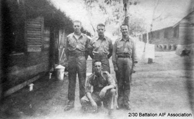 Birdwood Camp, Singapore
Left to right:

Standing:
1) NX52253 - MUFFETT, Donald (Don), Pte. - BHQ, Battalion Store
2) NX32560 - WRIGHT, Eric Stanley (Curly), Pte. - BHQ, Battalion Q. Store
3) NX59108 - DEVEIGNE, Wilfred Joseph (Jimmy), A/U/Cpl. - BHQ, Battalion Store

Kneeling:
1) NX29810 - HANNAN, Francis Patrick (Frank), Pte. - BHQ, Battalion Store
