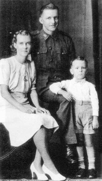 Les Davidson and family
Left to right:

1) Mrs. Madelaine May DAVIDSON
2) NX53639 - DAVIDSON, Ernest Leslie (Les), Pte. - HQ Company, Signals Platoon
3) 
