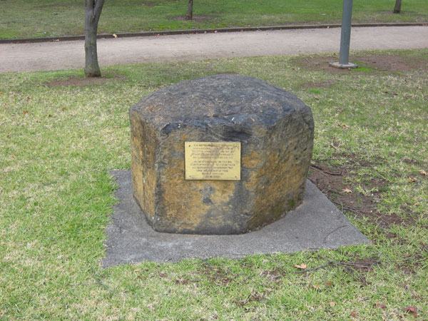Robertson Park, Orange
The 2/30 Battalion memorial stone and plaque, in Robertson Park, Orange, NSW, which commemorates the day that the 2/30 Battalion marched through Orange, prior to leaving for overseas service. Alongside the cairn is a golden elm, Lady G's tree, which was planted at the dedication ceremony on 23rd November, 1991.

The wording on the plaque reads:

    "2/30 Australian Infantry Battalion Eighth Division A.I.F. marched through the City of Orange on 15th June 1941 led by their C.O. Lieut. Col. (later Brigadier) Sir F. G. Galleghan DSO OBE ED ISO.
    On 23rd November 1991, this tree was planted by members of the 2/30 Battalion A.I.F. Association to commemorate that event and in memory of those who gave their lives.
    Lest We Forget."

Keywords: robertsonpark