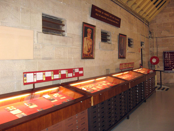 Army Museum of NSW
Medal display and cabinets, and portraits of Brigadier Sir Frederick Galleghan, DSO OBE ISO ED, former Commanding Officer of 2/30 Battalion, and his wife, Lady Galleghan, OBE.

The display is known as the "Brigadier Sir Frederick and Lady Galleghan Hall of Gallantry and Distinguished Service", and is located within the Army Museum of NSW.

NX70416 - GALLEGHAN (Sir), Frederick Gallagher (Black Jack), Brig. - CO. 2/30 Bn.
Keywords: ArmyMuseumNSW