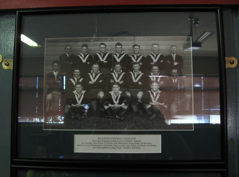 Diggers Tavern, Bellingen
Football team photo in the Bellingen Digger's Tavern.

The Digger's Tavern is the former Bellingen RSL. The RSL moved to the Bellingen Bowling Club in 2008.

The caption reads:

"BELLINGEN FOOTBALL TEAM 1938
Photo taken Bellingen Footbal Ground in McNally's Paddock.
Roy Sheridan, Gerry Bailey, Col Wisely, Jock Hetherington, Dougy Behan, Jim Brownlee,
Ron Kenny, Eric McFadyen (Sec), Jack Bailey, Dick Lavender, Sally Taylor, Jim Woods, Tom Behan,
Stan McDougall (Pres), Slippy Haigh, Ted Bailey, Bob Bailey."

Oliver Behan and three members of the Bailey family enlisted in World War 2, from Bellingen, and served with the 2/30 Battalion:

1) NX46609 - BAILEY, Gerard John (Gerry), Pte. - HQ Company, Transport Platoon 
2) NX46825 - BAILEY, Michael Albert (Mick), Pte. - HQ Company, Transport Platoon 
3) NX46624 - BAILEY, William Joseph (Sawyer Bill), Pte. - HQ Company, Transport Platoon 
4) NX54271 - BEHAN, Oliver John (Bully), Pte. - B Company, 12 Platoon
Keywords: 090119a