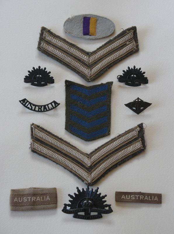 Various Insignia
Includes 2/30 Battalion colour patch, Rising Sun badges, 5 year service stripes, and Corporal stripes.
Keywords: 100214c NX32306