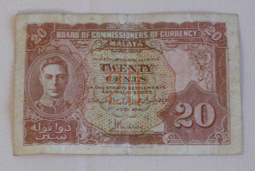Malayan money
Twenty cent note of the Straits Settlements and Malay States.
Keywords: 100214c NX32306