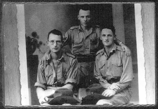 Singapore, 1941
Left to right:
1) NX46929 - MIDDLETON, William (Bill), A/U/Sgt. - BHQ. Band. Concert Party Orchestra Leader
2) NX68235 - COPLEY, Francis Peter (Frank), Pte. - BHQ. Band.
3) NX36324 - BROUFF, Charles William (Charlie), Pte. - BHQ. Band. 
Keywords: 100216a