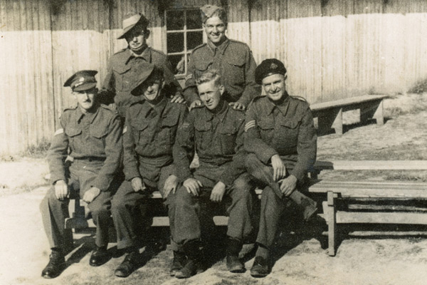 Training in Australia
Arthur Skene in uniform (standing on the right).

Left to right:
Front row:
1) ?
2) ?
3) ?
4) ?

Back row standing:
1) ?
2) NX30114 - Pte. William Hartridge (Bill) SKENE - C Company, 14 Platoon
Keywords: 20120722 NX30114