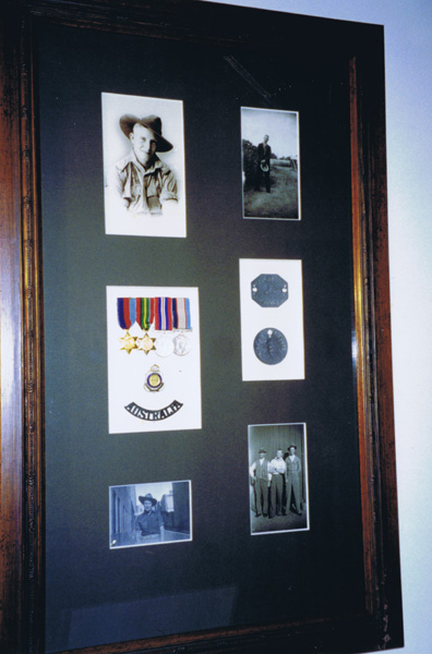 Display case
Display case for NX2578 - Pte. Ross HANN. Includes service medals, dog tags, and various photographs.

NX2578 - HANN, Ross Mervyn, Pte. - A Company, 9 Platoon
Keywords: 20130101a NX2578HANN