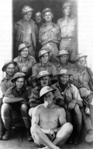 Bathurst Army Camp
A Family of Australian Evans (1820-1997): Group of soldiers in training from 2/30th Battalion at Bathurst (early 1941). Snow is second row at left.

Left to right:
Top row:
1)
2)
3)
4)

Middle row:
1)
2) possibly NX33290 - CHAPMAN, Keith Milford (Chappie), Pte. - A Company, 8 Platoon
3) possibly NX33078 - CUNNINGHAM, Robert Archibald (Bob), Pte. - A Company, 8 Platoon
4) possibly NX31369 - STOKES, Cecil, Pte. (Curley) - A Company, 8 Platoon

Bottom row:
1) NX31359 - EVANS, Cecil Frank (Snow), L/Sgt. - A Company, 8 Platoon
2)
3)
4) possibly NX29922 - GIBBS, Ronald Douglas (Ron), Pte. - A Company, 8 Platoon

Front:
1)

Keywords: 20150117a