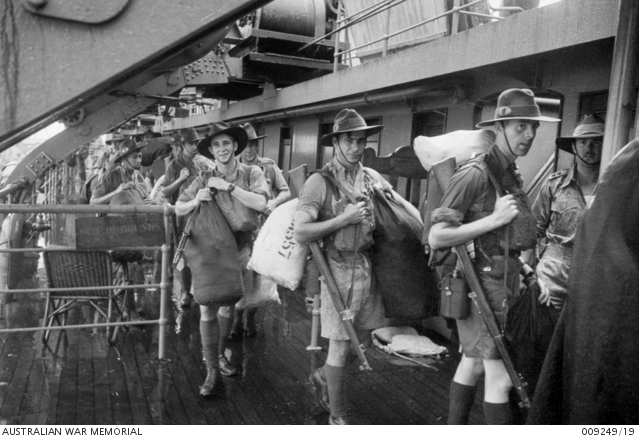 Arriving in Singapore
Troops, possibly members of 2/30 Battalion AIF, disembark from Johan Van Oldenbarnevelt (HMT FF), part of Convoy US11B.

The Officer and three soldiers facing the camera may be, from left to right:
1)
2) NX47557 - ROBERTS, William, Pte. - HQ Company, Carrier Platoon
3)
4)
Keywords: 20131118a Johan