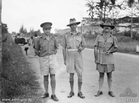 Singapore, 20/9/1945
Australian War Memorial caption reads:
SINGAPORE, STRAITS SETTLEMENTS, 1945-09-20. LIEUT-COL C.H. KAPPE, CHIEF OF STAFF, AUSTRALIAN IMPERIAL FORCE PRISONERS OF WAR - MALAYA (1), MAJOR N. MCG. JOHNSTON, ADMINISTRATIVE COMMAND, 2/30 AUSTRALIAN INFANTRY BATTALION (2) AND LIEUT-COL FREDERICK (BLACK JACK) G. GALLEGHAN, DSO, ED, COMMANDING OFFICER, 2/3RD AUSTRALIAN INFANTRY BATTALION, ALL EX-PRISONERS OF WAR OF THE JAPANESE.

Left to right:
1) VX48789 - KAPPE, Charles Henry, Lieut. Col - Chief of Staff, A.I.F. POW - Malaya
2) NX70416 - GALLEGHAN (Sir), Frederick Gallagher (Black Jack), Brig. - BHQ. CO. 2/30 Bn. D.S.O., O.B.E., I.S.O., E.D., K.B.
3) NX70427 - JOHNSTON, Noel McGuffie (Charlie Chan), Lt. Col. - BHQ. 2 I/c Bn. MiD E.D.
Keywords: 100105c