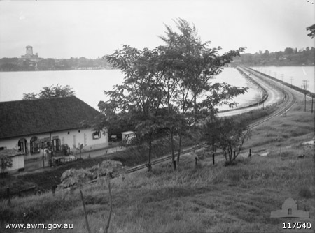 Causeway, Singapore
AWM caption reads:
SINGAPORE, STRAITS SETTLEMENTS. 1945-09-27. THE CAUSEWAY JOINING SINGAPORE ISLAND WITH JOHORE STATE ON THE MALAYAN MAINLAND, WHERE FROM 1942-01-31 TO 1942-02-09, MEMBERS OF 2/30TH INFANTRY BATTALION CAME UNDER HEAVY ENEMY SHELLFIRE. WHEN THE ALLIED TROOPS HAD CROSSED, THE CAUSEWAY WAS DEMOLISHED 50 YARDS FROM THE JOHORE SHORE AND FOR 50 YARDS. TO JOIN PHOTOGRAPH NO. 117539 (LEFT).
Keywords: 100105c