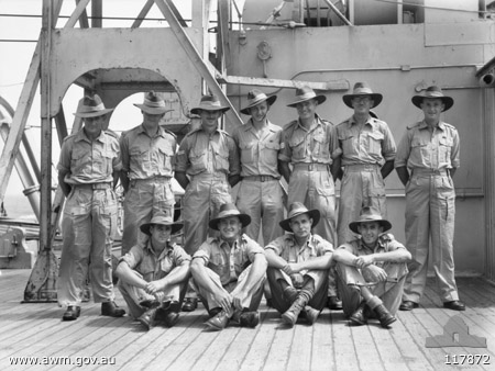 On board MV Highland Brigade, 13/10/1945
Australian War Memorial caption reads:
AT SEA. 1945-10-13. PERSONNEL OF 2/30TH INFANTRY BATTALION, EX-POWS OF THE JAPANESE, ABOARD THE BRITISH TROOPSHIP MV HIGHLAND BRIGADE DURING THEIR JOURNEY HOME TO AUSTRALIA.

The following members of 2/30 Battalion were known to have returned to Australia on the MV Highland Brigade:
1) NX50024 - BREWIN, Colin Gordon, Pte. - D Coy. 16 Pl. 
2) NX37577 - BRUCE, John (Stanley) (Stan), Cpl. - BHQ Coy.  Pl. Postal Unit attached
3) NX56719 - BURBURY, Reginald (Reg), Pte. - A Coy. Coy. Store Pl. 
4) NX29821 - BURGESS, Clarence John (Clarrie), L/Cpl. - A Coy. 7 Pl.
5) NX43783 - CREER, John Alexander, Pte. - Ex Java 
6) NX36271 - GOUGH, William George (George), Pte. - BHQ Coy. Band Pl. 
7) NX69322 - GRIFFITHS, Frederick Wallace (Professor), Pte. - B Coy. 10 Pl. 
8) NX57453 - HAMILTON, John Allan Reginald (Allan), Cpl. - A Coy. 9A Pl. WiA Gemas
9) NX37296 - JONES, Ashley Chave, Pte. - C Coy. 13 Pl. 
10) NX35394 - LEDWIDGE, Sidney John (Tex), Pte. - B Coy. 12A Pl. Ex 2/19 Bn 10/2/1942
11) NX30116 - NAIRNE, Lawrence, Pte. - B Coy.  Pl. Rnf; ToS 16/1/1942 ex MLFDU; to MLFDU 17/3/1942
12) NX31047 - O'CONNELL, James (James Patrick) (Paddy), Pte. - A Coy. 9 Pl. 
13) QX24188 - THOMAS, John Hedley Star, Pte. - B Coy. 12 Pl. Ex 2/26 Bn 2/2/1942
Keywords: 100105c