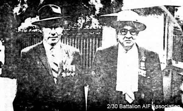 Makan 231
Bruce Ford and Walter Douglas. Photo was taken near the Assembly Point for one of the Anzac Day Marches, when the Bn had to fall in near The Registrar General's Office entrance to the Domain so that it would be three or four years ago.

Left to right:
1) NX26230 - FORD, Bruce Victor, A/U/L/Sgt. - D Company, 16 Platoon
2) NX66651 - DOUGLAS, Walter Lewis (Darkie), Pte. - BHQ, Cook D Company
Keywords: Makan231