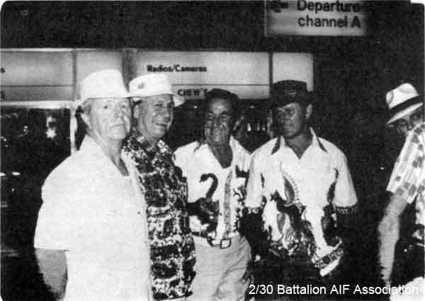 1979 Tour, Day 15
Singapore 25/1/1979 - ready for the trip back to Sydney. Left to right: Norm King, Athol Charlesworth, Bill Sorenson (snake man), Reg Napper (has just let his bird of paradise escape) - Batik colourful safari jackets - Ron Maston just makes the scene on the extreme right.

1) NX36471 - KING, Norman Leo (Norm), L/Cpl. - D Company, 17 Platoon
2) NX36524 - CHARLESWORTH, Athol McNeil, Pte. - D Company, 16 Platoon
3) NX47521 - SORENSON, William George (Sorro or Bill), Pte. - D Company, 16 Platoon
4) NX47853 - NAPPER, Reginald (Reg), WO2 - D Company, 16 Platoon
5) NX70458 - MASTON, Ronald Harry (Bomb Happy), Capt. - C Company, 2 l/c

Included in the report of the 2/30 Bn Group Tour to Malaysia and Singapore. See details in [url=http://www.230battalion.org.au/Makan/Issues/Makan248.htm#Day15]Makan 248, Day 15, 25/1/1979.[/url]
Keywords: Makan248