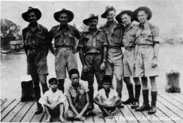 Training, Batu Pahat
Batu Pahat - 15/10/1941. A few of the Boys on a Sunday Tour around Batu Pahat, 15 October 1941.

Left to right:
1) NX2575 - CLAVAN, Leonard James (Len), Pte. - HQ Company, Transport Platoon
2) NX4401 - STUART, John Patrick (Jack), L/Cpl. - HQ Company, Transport Platoon
3) NX46624 - BAILEY, William Joseph (Sawyer Bill), Pte. - HQ Company, Transport Platoon 
4) NX39551 - CLAVAN, Aubrey Alan (Aub), Pte. - HQ Company, Transport Platoon 
5) NX65335 - BREMNER, John William (Jack), Pte. - HQ Company, Transport Platoon 
6) NX27335 - McKNIGHT, Gordon Leslie, Sgt. - HQ Company, Transport Platoon 

Keywords: Makan262