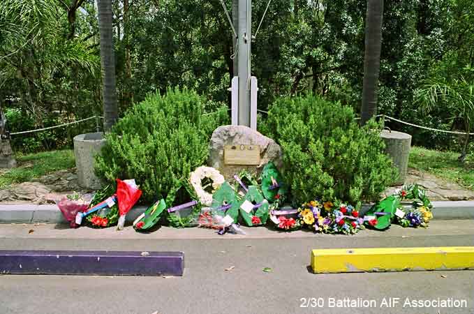 Gemas Day, 2004
The Gemas memorial at 17 RNSWR Depot at Pymble.

The memorial includes two concrete tank traps which were used in the road block at Gemas, Malaya in January 1942.
Keywords: Pymble