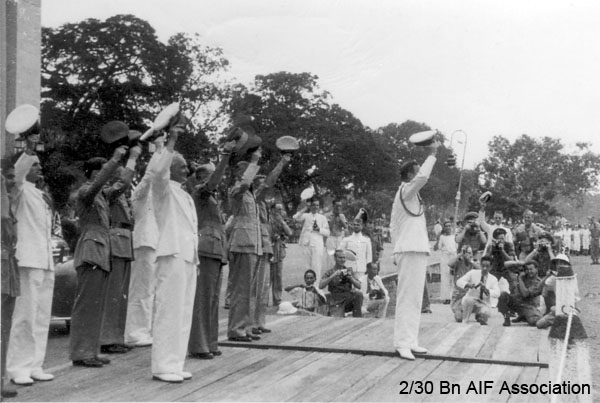 Japanese surrender, Singapore, 1945
Facing the padang, outside the Singapore Municipal Buildings, during the Japanese surrender ceremony.
Keywords: Surrender