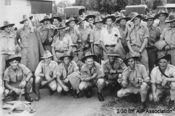 Carrier Platoon
Left to right:

Back row:
1) possibly NX27235 - CROSS, Arthur Henry William, Cpl. - HQ Company, Carrier Platoon
2) possibly NX20450 - MASON, Peter, Cpl. - HQ Company, Carrier Platoon (with coat over shoulder)
3) possibly NX66000 - HASKINS, John (Massa), Sgt. - HQ Company, Carrier Platoon (leaning forward)
4) (at rear)
5) possibly NX25780 - GODLEY, David (Scotty), Pte. - HQ Company, Carrier Platoon
6) 
7) possibly NX33350 - HEATH, Clarence Albert, Pte. - HQ Company, 4, Carrier Platoon
8) possibly NX54034 - CHRISTOFF, George Joseph, Sgt. - HQ Company, Carrier Platoon (hand over face)
9)
10) (obscured at rear)
11) NX27205 - KINSELA, George Michael, Pte. - HQ Company, Carrier Platoon 
12) (obscured at rear)
13) possibly NX47557 - ROBERTS, William (Bill), Pte. - HQ Company, Carrier Platoon 
14)
15)
16)
17)

Front row, kneeling:
1) possibly NX47801 - HARRINGTON, Ernest Clarence (Ernie), Pte. - HQ Company, Carrier Platoon 
2) NX12542 - TOMPSON, Richard Clive, Capt. - HQ Company, O/C Carrier Platoon 
3)
4)
5)
6)
7)
8) NX25731 - KANE, Russell John, Pte. - HQ Company, Carrier Platoon
