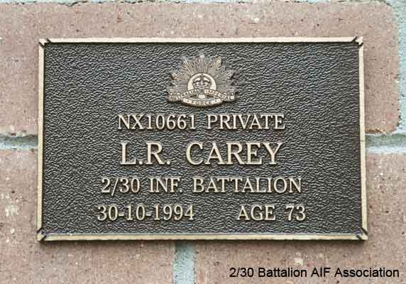 NX10661 - CAREY, Luke Robert, Pte. - HQ Company, Mortar Platoon
View of the bronze plaque erected in the NSW Garden of Remembrance on Wall 16, Row G. The garden is adjacent to Sydney War Cemetery at the Rookwood Necropolis, and is maintained by The Office of Australian War Graves.

The plaques are provided by The Office of Australian War Graves to commemorate eligible veterans who have died post war and whose deaths are accepted as being caused by war service. This form of commemoration is used when there is a private memorial elesewhere, or for some reason, the Office is unable to provide an official memorial at the relevant Cemetery or Crematorium.
