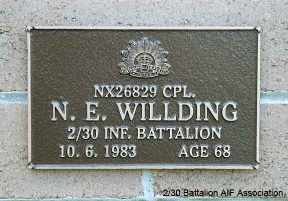 NX26829 - WILLDING, Norman Eric, Cpl. - B Company, 11 Platoon
View of the bronze plaque erected in the NSW Garden of Remembrance on Wall 43, Row D. The garden is adjacent to Sydney War Cemetery at the Rookwood Necropolis, and is maintained by The Office of Australian War Graves.

The plaques are provided by The Office of Australian War Graves to commemorate eligible veterans who have died post war and whose deaths are accepted as being caused by war service. This form of commemoration is used when there is a private memorial elesewhere, or for some reason, the Office is unable to provide an official memorial at the relevant Cemetery or Crematorium.

