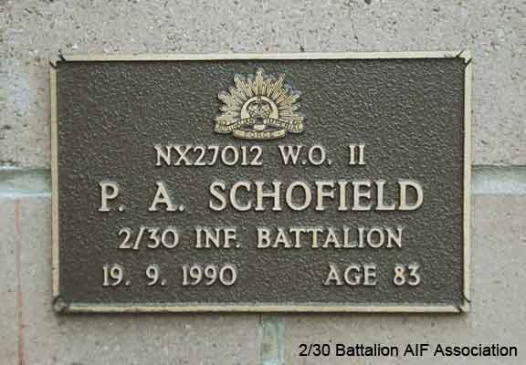 NX27012 - SCHOFIELD, Phillip Alfred (Schoey), WO2 - C Company, CSM
View of the bronze plaque erected in the NSW Garden of Remembrance on Wall 15, Row C. The garden is adjacent to Sydney War Cemetery at the Rookwood Necropolis, and is maintained by The Office of Australian War Graves.

The plaques are provided by The Office of Australian War Graves to commemorate eligible veterans who have died post war and whose deaths are accepted as being caused by war service. This form of commemoration is used when there is a private memorial elesewhere, or for some reason, the Office is unable to provide an official memorial at the relevant Cemetery or Crematorium.
