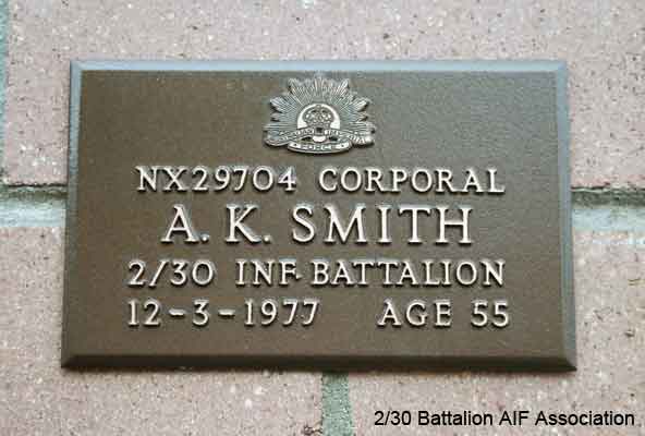 NX29704 - SMITH, Allen Keith, A/L/Cpl. - D Company, Storeman
View of the bronze plaque erected in the NSW Garden of Remembrance on Wall 8, Row A. The garden is adjacent to Sydney War Cemetery at the Rookwood Necropolis, and is maintained by The Office of Australian War Graves.

The plaques are provided by The Office of Australian War Graves to commemorate eligible veterans who have died post war and whose deaths are accepted as being caused by war service. This form of commemoration is used when there is a private memorial elesewhere, or for some reason, the Office is unable to provide an official memorial at the relevant Cemetery or Crematorium.

