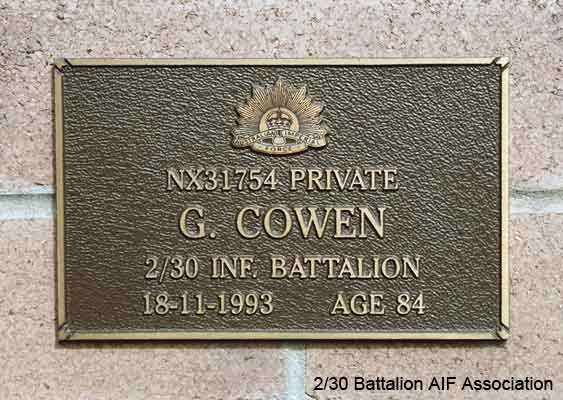 NX31754 - COWEN, George (Mick), Pte. - B Company, Coy. HQ
View of the bronze plaque erected in the NSW Garden of Remembrance on Wall 27, Row J. The garden is adjacent to Sydney War Cemetery at the Rookwood Necropolis, and is maintained by The Office of Australian War Graves.

The plaques are provided by The Office of Australian War Graves to commemorate eligible veterans who have died post war and whose deaths are accepted as being caused by war service. This form of commemoration is used when there is a private memorial elesewhere, or for some reason, the Office is unable to provide an official memorial at the relevant Cemetery or Crematorium.
