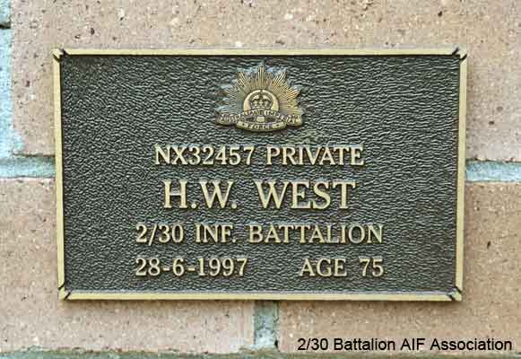 NX32457 - WEST, Henry Walte, Pte. - HQ Company, A/A Platoon
View of the bronze plaque erected in the NSW Garden of Remembrance on Wall 28, Row E. The garden is adjacent to Sydney War Cemetery at the Rookwood Necropolis, and is maintained by The Office of Australian War Graves.

The plaques are provided by The Office of Australian War Graves to commemorate eligible veterans who have died post war and whose deaths are accepted as being caused by war service. This form of commemoration is used when there is a private memorial elesewhere, or for some reason, the Office is unable to provide an official memorial at the relevant Cemetery or Crematorium.
