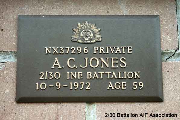 NX37296 - JONES, Ashley Chave, Pte. - C Company, 13 Platoon
View of the bronze plaque erected in the NSW Garden of Remembrance on Wall 6, Row F. The garden is adjacent to Sydney War Cemetery at the Rookwood Necropolis, and is maintained by The Office of Australian War Graves.

The plaques are provided by The Office of Australian War Graves to commemorate eligible veterans who have died post war and whose deaths are accepted as being caused by war service. This form of commemoration is used when there is a private memorial elesewhere, or for some reason, the Office is unable to provide an official memorial at the relevant Cemetery or Crematorium.
