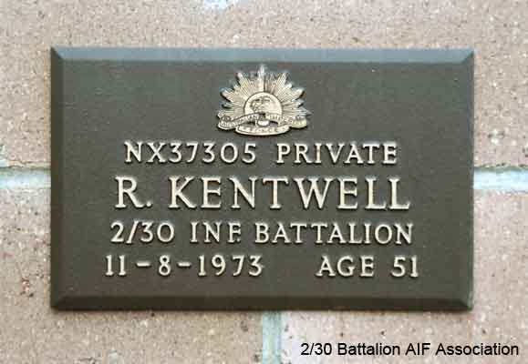 NX37305 - KENTWELL, Ronald (Popeye), Pte. - C Company, 13 Platoon
View of the bronze plaque erected in the NSW Garden of Remembrance on Wall 8, Row O. The garden is adjacent to Sydney War Cemetery at the Rookwood Necropolis, and is maintained by The Office of Australian War Graves.

The plaques are provided by The Office of Australian War Graves to commemorate eligible veterans who have died post war and whose deaths are accepted as being caused by war service. This form of commemoration is used when there is a private memorial elesewhere, or for some reason, the Office is unable to provide an official memorial at the relevant Cemetery or Crematorium.
