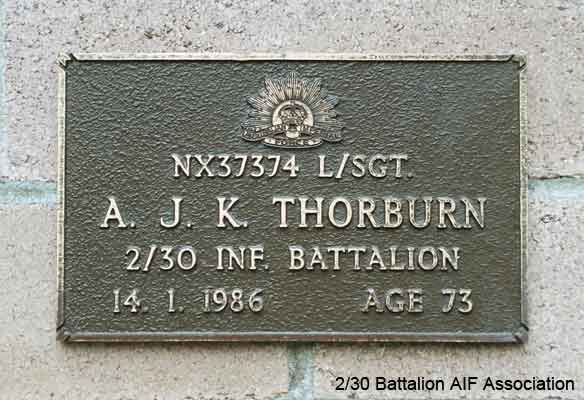 NX37374 - THORBURN, Archibald John Kennedy (Arch), A/U/L/Sgt. - C Company, HQ Platoon
View of the bronze plaque erected in the NSW Garden of Remembrance on Wall 25, Row C. The garden is adjacent to Sydney War Cemetery at the Rookwood Necropolis, and is maintained by The Office of Australian War Graves.

The plaques are provided by The Office of Australian War Graves to commemorate eligible veterans who have died post war and whose deaths are accepted as being caused by war service. This form of commemoration is used when there is a private memorial elesewhere, or for some reason, the Office is unable to provide an official memorial at the relevant Cemetery or Crematorium.
