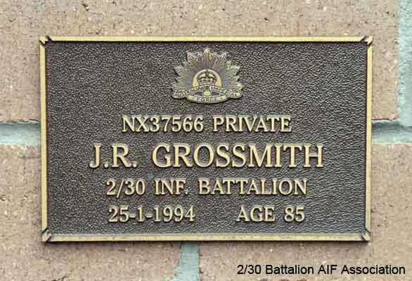 NX37566 - GROSSMITH, John Robert (Jack), Pte. - HQ Company, Signals Platoon
View of the bronze plaque erected in the NSW Garden of Remembrance on Wall 28, Row M. The garden is adjacent to Sydney War Cemetery at the Rookwood Necropolis, and is maintained by The Office of Australian War Graves.

The plaques are provided by The Office of Australian War Graves to commemorate eligible veterans who have died post war and whose deaths are accepted as being caused by war service. This form of commemoration is used when there is a private memorial elesewhere, or for some reason, the Office is unable to provide an official memorial at the relevant Cemetery or Crematorium.
