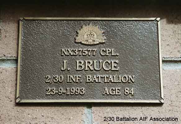 NX37577 - BRUCE, John (Stanley) (Stan), Cpl. - BHQ Company
View of the bronze plaque erected in the NSW Garden of Remembrance on Wall 27, Row I. The garden is adjacent to Sydney War Cemetery at the Rookwood Necropolis, and is maintained by The Office of Australian War Graves.

The plaques are provided by The Office of Australian War Graves to commemorate eligible veterans who have died post war and whose deaths are accepted as being caused by war service. This form of commemoration is used when there is a private memorial elesewhere, or for some reason, the Office is unable to provide an official memorial at the relevant Cemetery or Crematorium.
