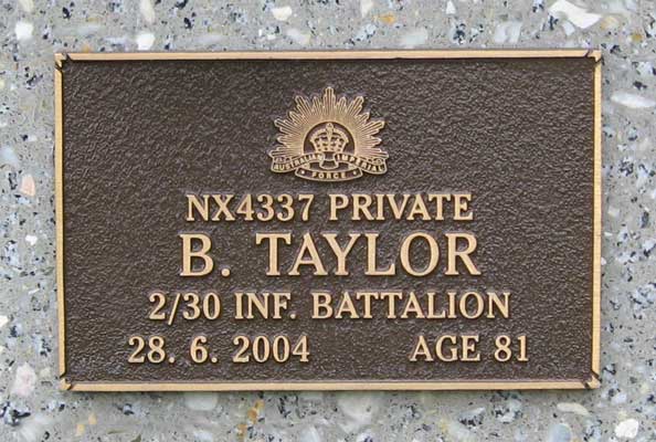 NX4337 - TAYLOR, Blair, Pte. - C Company, 15 Platoon
View of the bronze plaque erected in the ACT Garden of Remembrance on Wall 4, Row F, Column 1. The garden is within Woden Cemetery in Canberra, and is maintained by The Office of Australian War Graves.

The plaques are provided by The Office of Australian War Graves to commemorate eligible veterans who have died post war and whose deaths are accepted as being caused by war service. This form of commemoration is used when there is a private memorial elsewhere, or for some reason, the Office is unable to provide an official memorial at the relevant Cemetery or Crematorium.
Keywords: 071031a