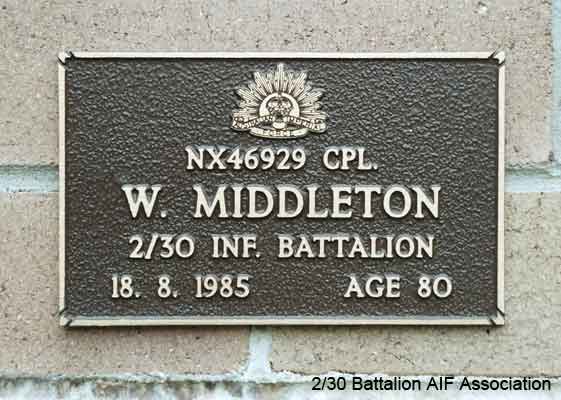 NX46929 - MIDDLETON, William (Bill), A/U/Sgt. - BHQ, Band
View of the bronze plaque erected in the NSW Garden of Remembrance on Wall 25, Row D. The garden is adjacent to Sydney War Cemetery at the Rookwood Necropolis, and is maintained by The Office of Australian War Graves.

The plaques are provided by The Office of Australian War Graves to commemorate eligible veterans who have died post war and whose deaths are accepted as being caused by war service. This form of commemoration is used when there is a private memorial elesewhere, or for some reason, the Office is unable to provide an official memorial at the relevant Cemetery or Crematorium.
