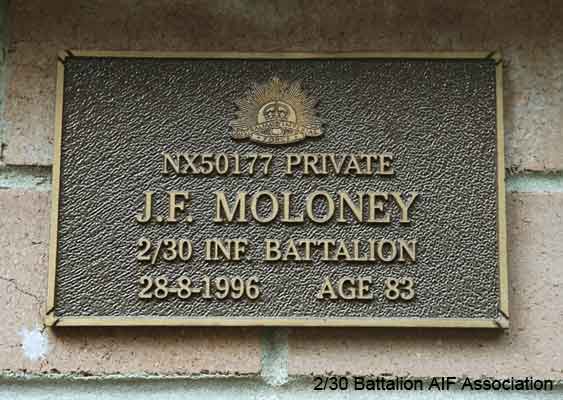 NX50177 - MOLONEY, John Frederick (Jack/Mal), Pte. - HQ Company, Signals Platoon
View of the bronze plaque erected in the NSW Garden of Remembrance on Wall 45, Row F. The garden is adjacent to Sydney War Cemetery at the Rookwood Necropolis, and is maintained by The Office of Australian War Graves.

The plaques are provided by The Office of Australian War Graves to commemorate eligible veterans who have died post war and whose deaths are accepted as being caused by war service. This form of commemoration is used when there is a private memorial elesewhere, or for some reason, the Office is unable to provide an official memorial at the relevant Cemetery or Crematorium.
