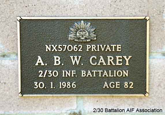 NX57062 - CAREY, Athol Bligh Wilpent, Pte. - A Company, 8 Platoon
View of the bronze plaque erected in the NSW Garden of Remembrance on Wall 27, Row B. The garden is adjacent to Sydney War Cemetery at the Rookwood Necropolis, and is maintained by The Office of Australian War Graves.

The plaques are provided by The Office of Australian War Graves to commemorate eligible veterans who have died post war and whose deaths are accepted as being caused by war service. This form of commemoration is used when there is a private memorial elesewhere, or for some reason, the Office is unable to provide an official memorial at the relevant Cemetery or Crematorium.
