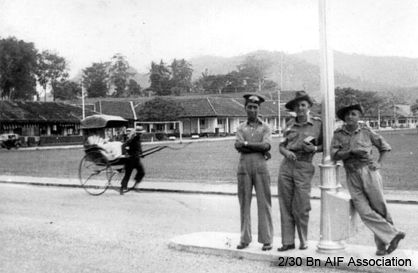 Real Aussies in Johore State, Malaya
"Pity there was a censor"
Left to right: 1) Unknown, 2) NX47951 - NAGLE, Athol Gervase, L/Sgt. - B Ord. Room, 3) unknown
Keywords: Malaya