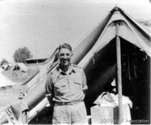 In camp at Tamworth
Outside one of the tents at Tamworth. In the background is the Showground pavillion.
NX34792 - DUFFY, Desmond Jack, Col. - O/C B Company.
Keywords: tamworthshowground