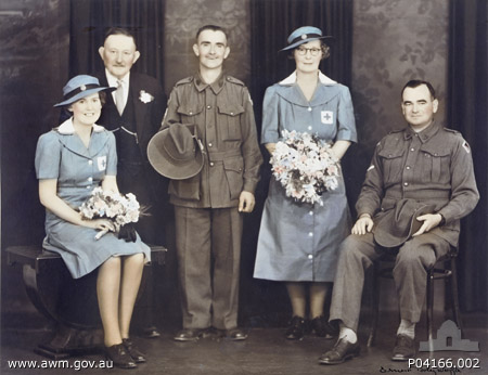 NX35482 - MOUNTFORD, Lawrence Gordon (Laurie), L/Cpl. - BHQ, Band
Australian War Memorial caption reads:
Group portrait taken at the wedding of Laurence (Laurie) Mountford and Louisa Ellen Lyford. Identified, left to right: Sadie Slocum, Voluntary Aid Detachment (VAD) Australian Red Cross; William Henry Lyford; VX35482 Private (Pte) Lawrence Gordon Mountford, 2/30 Battalion; Louisa Lyford, VAD Australian Red Cross; and an unidentified Lance Corporal of 2/30 Battalion. Pte Mountford, of Leeton, NSW (originally of Longton, England), was taken prisoner of war in Malaya during the Second World War. Donor L Johnstone.
Keywords: 100105c